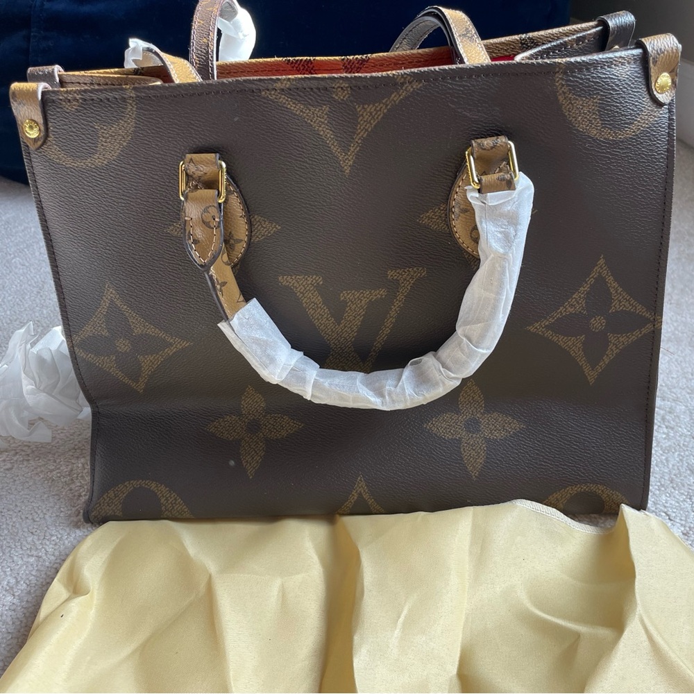 LV knock off tote . Dark brown and light brown on each side